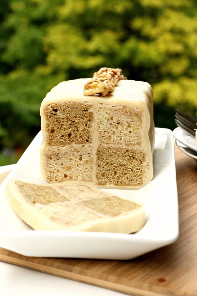 Battenberg cake with coffee and walnuts cut into slices