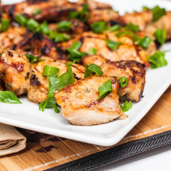 Asian Grilled chicken thighs on a plate