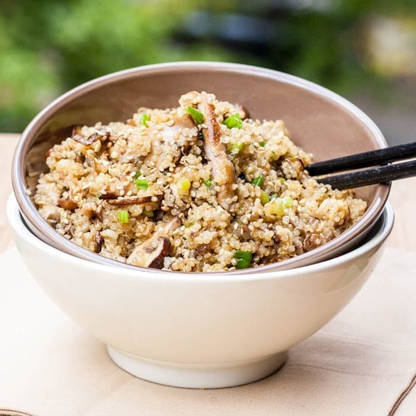 Toasted Quinoa with Mushrooms served in a bowl with chopsticks
