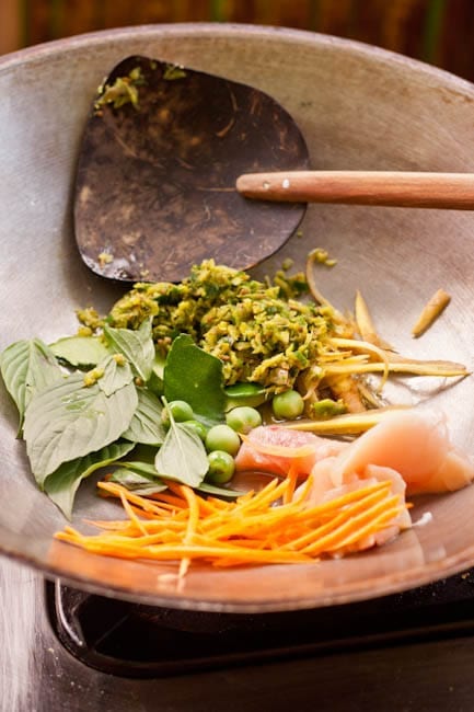 ingredients in a wok for the Thai chicken green curry