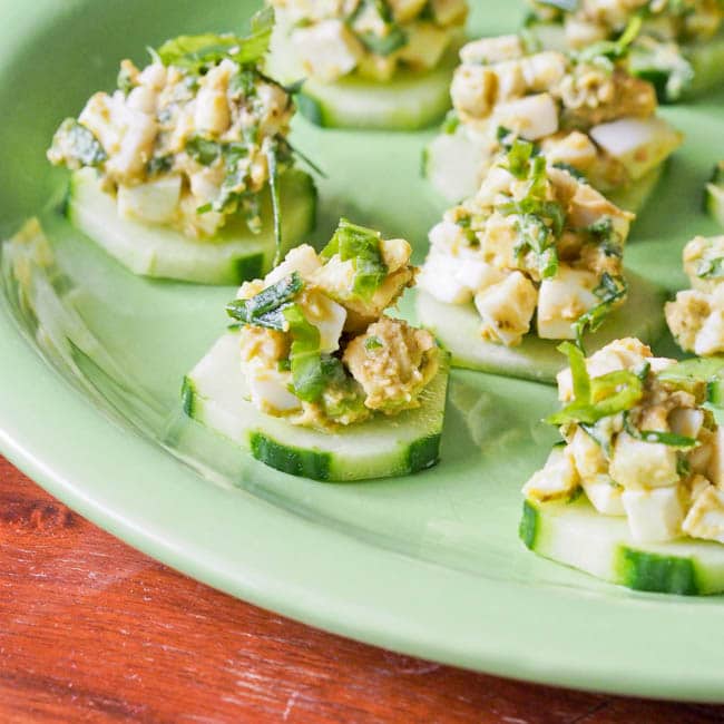Avocado Pesto Egg Salad Appetizers served on cucumber rounds