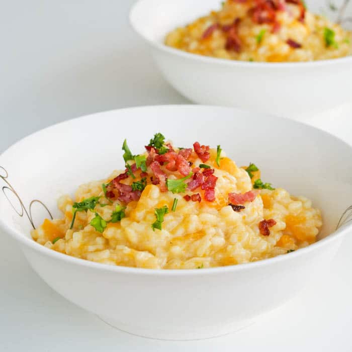 acorn squash risotto drizzled with bacon