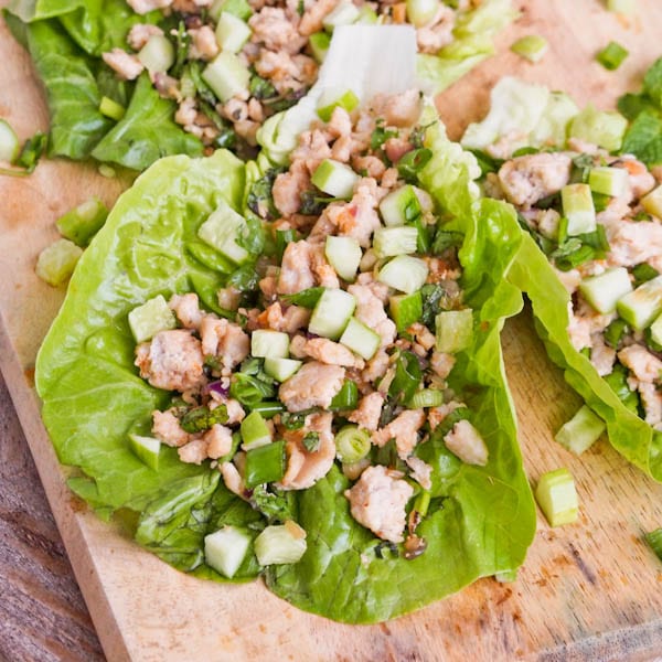 Asian chicken lettuce wraps made with ground chicken, cucumbers and herbs