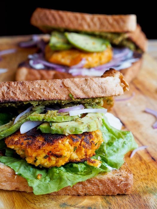 Tofu burger served on bread with avocado and lettuce