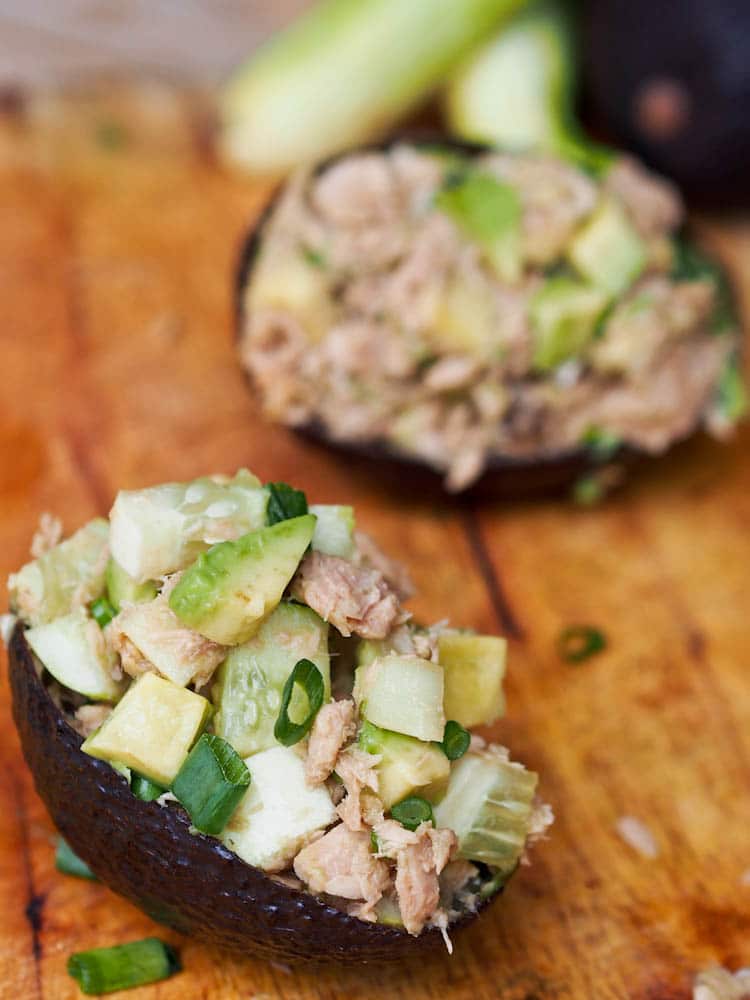 Tuna Stuffed Avocado Boats with cucumbers and scallions