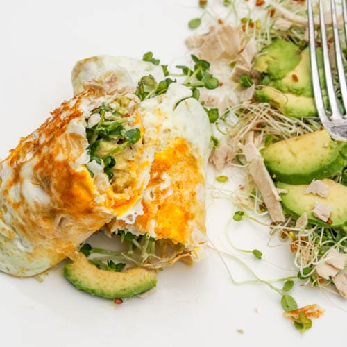 Egg Crepes stuffed with Avocados, turkey cold cuts and alfalfa