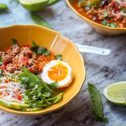 Warm up with this comforting gluten-free chicken ramen soup with eggs, bean sprouts, snap peas, noodles, cilantro and lime juice. The ultimate comfort food. Dairy Free too. Skip the take out and make this ramen soup at home instead. |avocadopesto.com