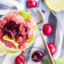 A tasty and refreshing guilt free summer treat: Boozy peach lime Italian ice with tipsy cherries is made with all natural ingredients, gluten-free, vegan and refined sugar free and is the perfect way to cool down in the summer. Just a handful of ingredients needed. | avocadopesto.com