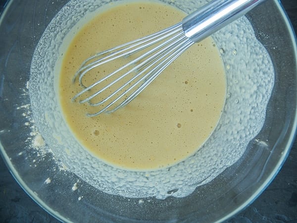 Making chickpea flatbread batter
