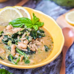This eight ingredient vegan orzo kale white bean soup with pesto comes together in 30 minutes and is hearty enough for a full meal. Perfect for cooler fall nights. Gluten Free. | avocadopesto.com