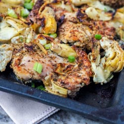 Only 4 key ingredients needed for these low fuss, minimal clean up 30 minute artichoke and garlic broiled chicken thighs. A classic go to weeknight dinner recipe. Healthy and delicious. Gluten Free and Dairy Free. | avocadopesto.com