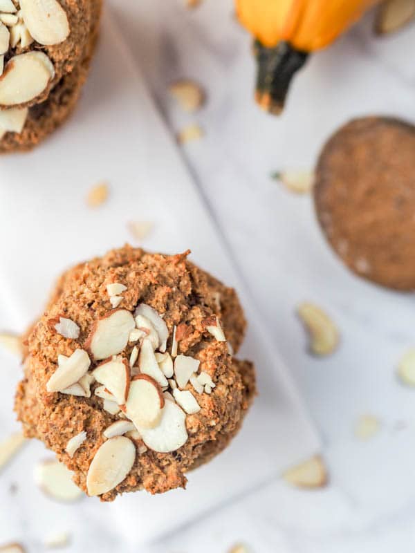 healthy pumpkin cookies topped with sliced almonds 