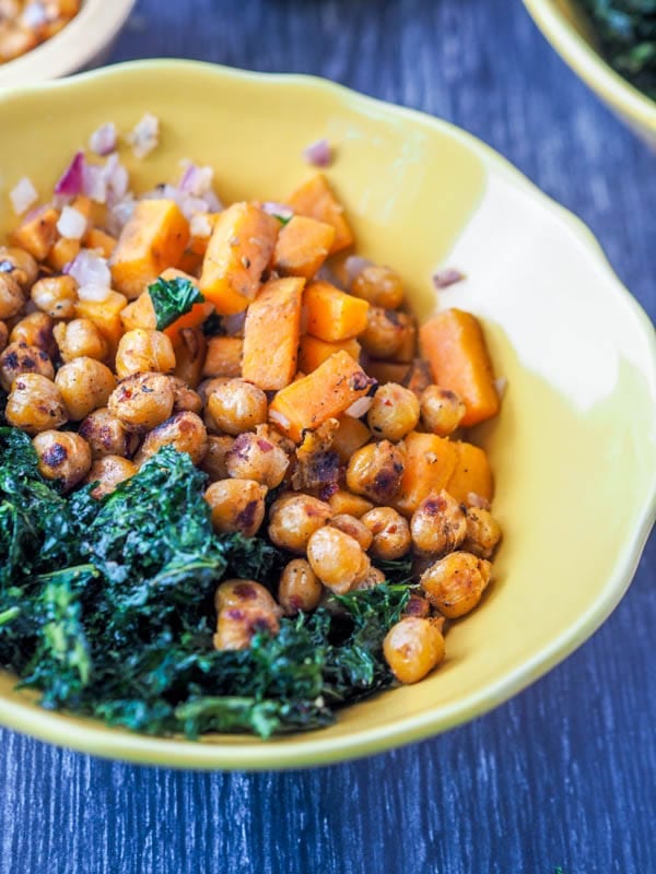 Vegan Power Bowl with kale, chickpeas, sweet potatoes and red onions 
