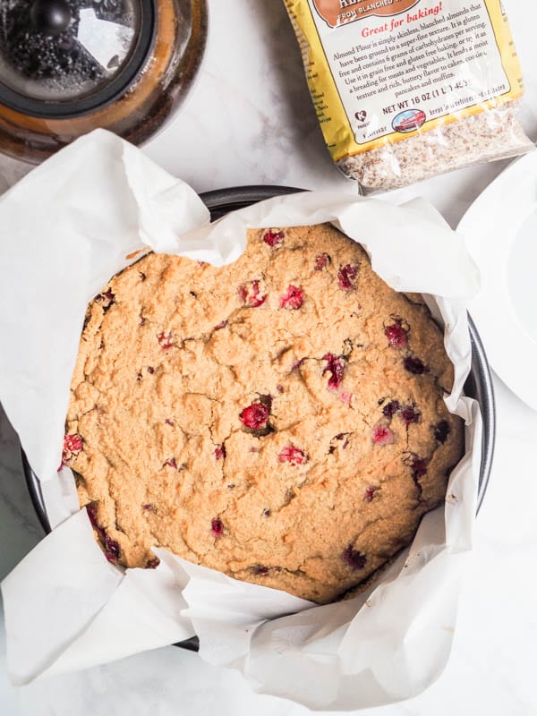 baked whole Vegan and Gluten Free Almond Cake with Cranberries