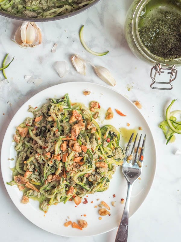 Whole 30 pesto, paleo, gluten-free, dairy-free and low carb zucchini noodle pasta with pesto and chicken makes for the perfect healthy weeknight dinner. Ready in 30 minutes. 