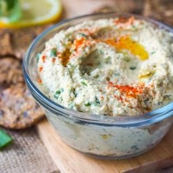 Six ingredient vegan cream cheese that is herb flavored with scallions and cilantro. GF + Paleo too. Makes for a perfect spread or dip for crackers.
