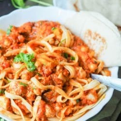 Super simple 30 min pasta with chicken and chickpeas recipe in a creamy tomato, pumpkin and yogurt sauce. A most decadent and healthy creamy pasta dish. GF + DF.
