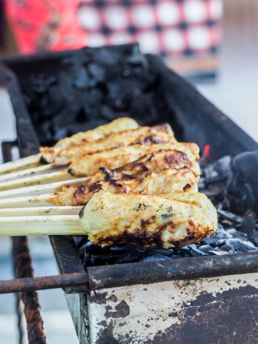 Grilled fish skewers being cooked on the grill