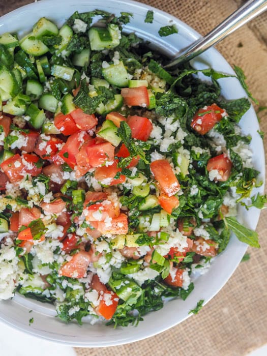 Tabouli mixed together in a large salad bowl