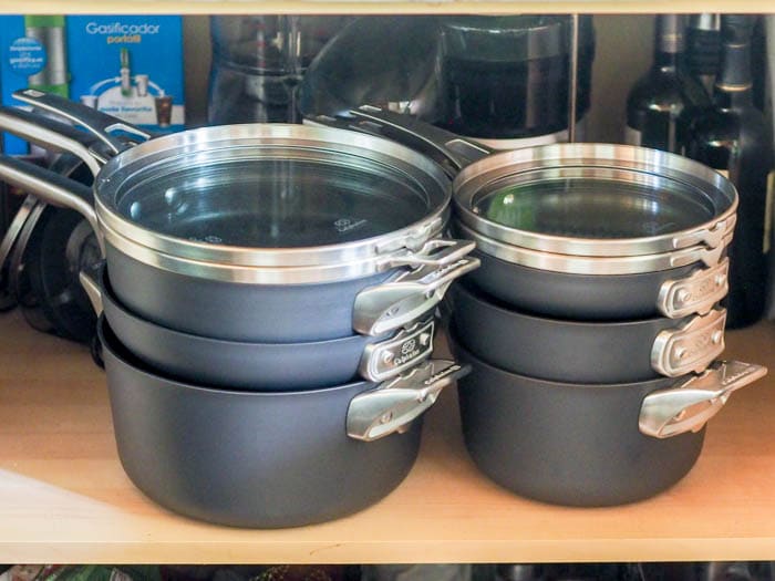 Calphalon PremierTM Space Saving Nonstick Cookware in the cabinet