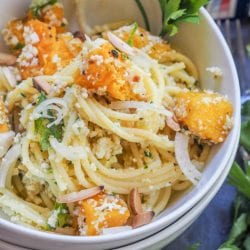 Cauliflower pasta made with roasted pumpkin and a crunchy nutty raw cauliflower pesto is bound to be your new favorite meatless vegan dinner. A hearty and healthy gluten free meal.