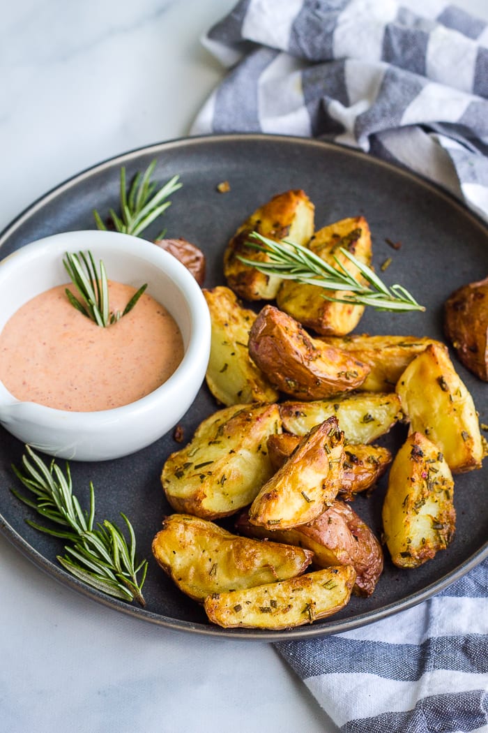 Roasemary Roasted Potatoes in wedges ready to eat